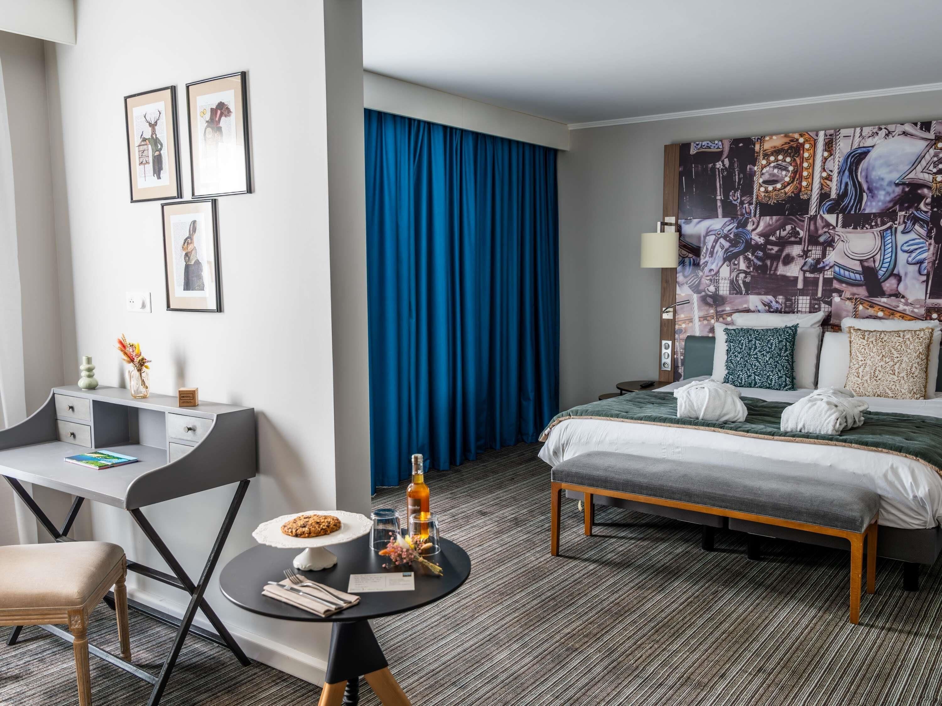 Suite Deluxe, 1 letto king con divano letto | Materassi a doppio strato, una cassaforte in camera