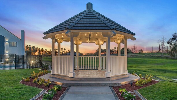 A gazebo with a tiled roof, surrounded by a landscaped garden with a pathway leading to it. - Staybridge Suites Oxnard River Ridge by IHG (Oxnard)