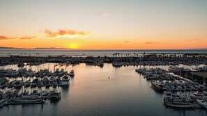 A marina filled with boats at sunset. - Staybridge Suites Oxnard River Ridge by IHG (Oxnard)