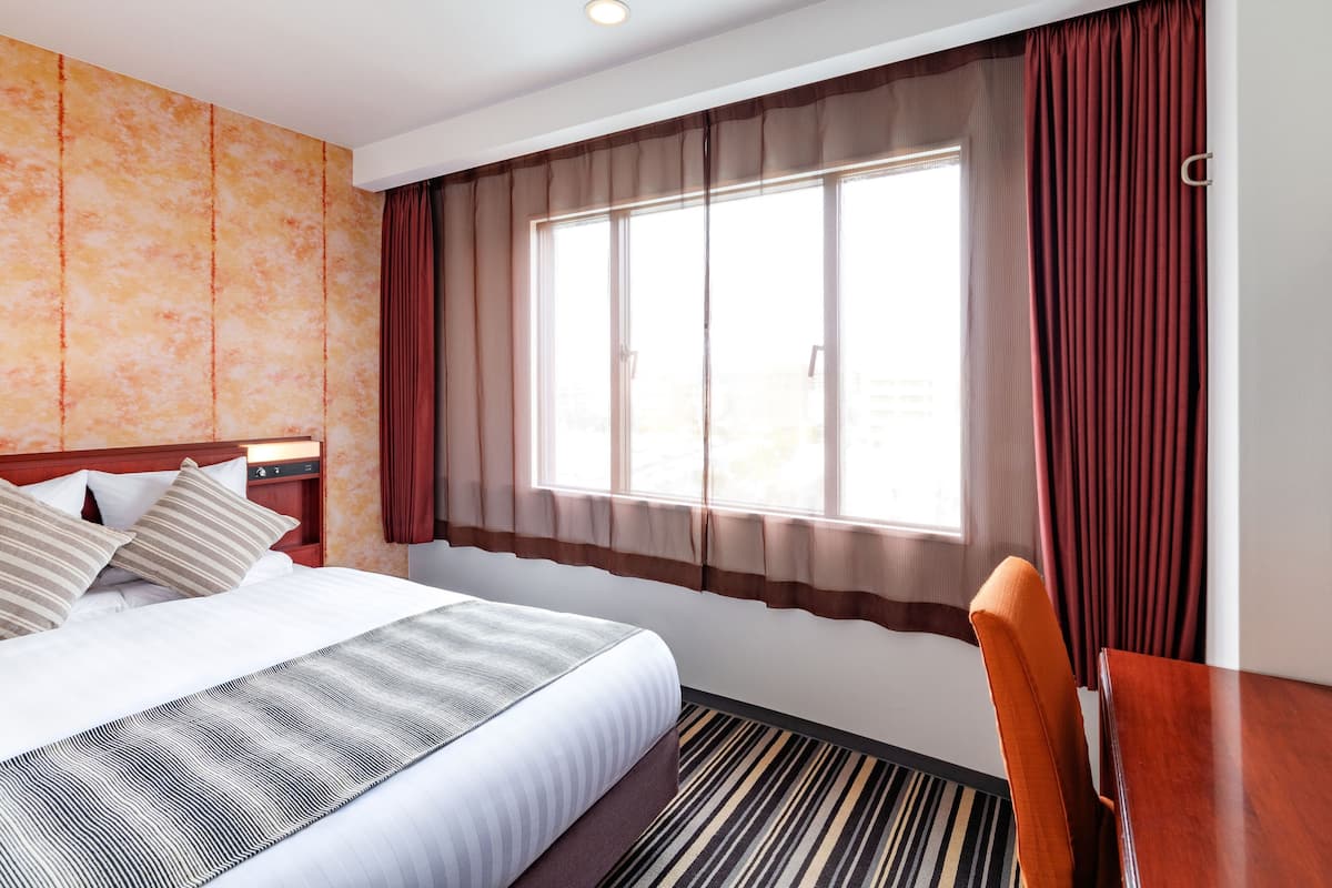 In-room safe, desk, blackout curtains, iron/ironing board (on request)