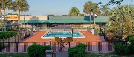 Outdoor pool, pool umbrellas, sun loungers