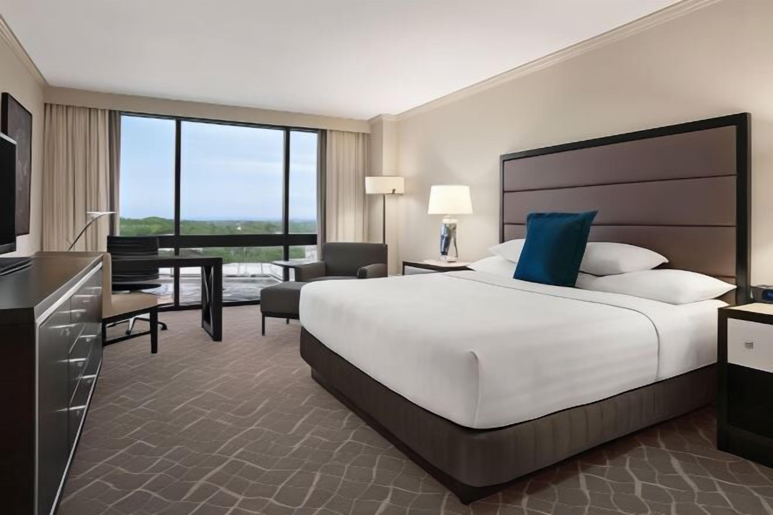 Premium bedding, down comforters, in-room safe, desk