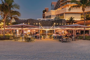 On the beach, beach cabanas, sun loungers, beach umbrellas