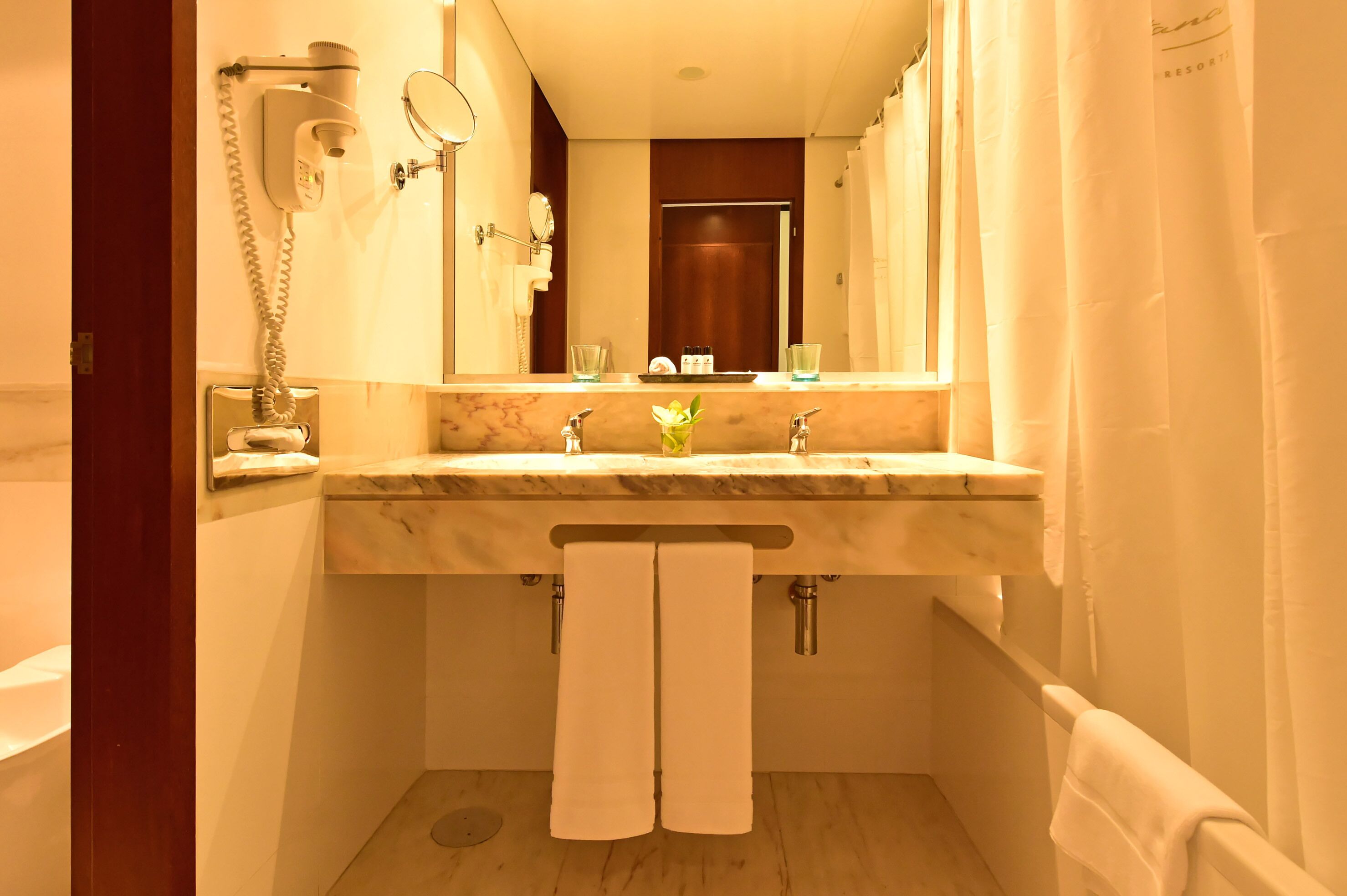 combined shower/bathtub, free toiletries, hair dryer, bathrobes