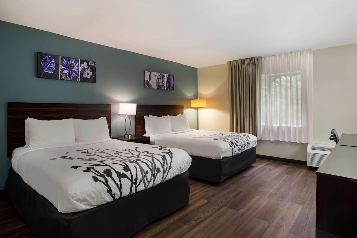 Down duvets, pillow-top beds, desk, blackout curtains