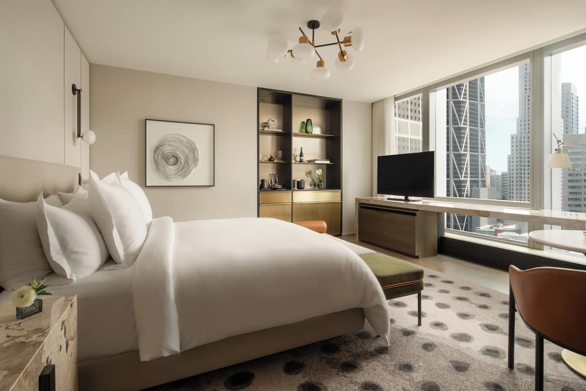 Chambre « Premier », 1 trÚs grand lit, accessible aux personnes à mobilité réduite