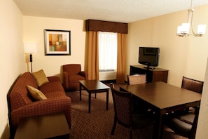 Suite, 1 King Bed, Non Smoking, Jetted Tub (with Sofabed) | In-room safe, desk, laptop workspace, iron/ironing board