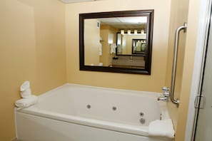 Suite, 1 King Bed, Non Smoking, Jetted Tub (with Sofabed) | Bathroom | Free toiletries, hair dryer, towels
