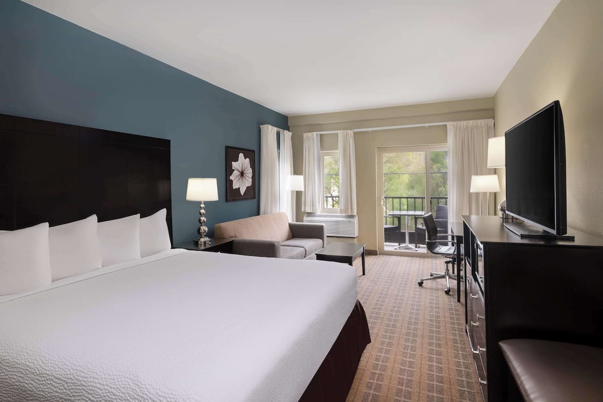 Premium bedding, pillow-top beds, desk, laptop workspace