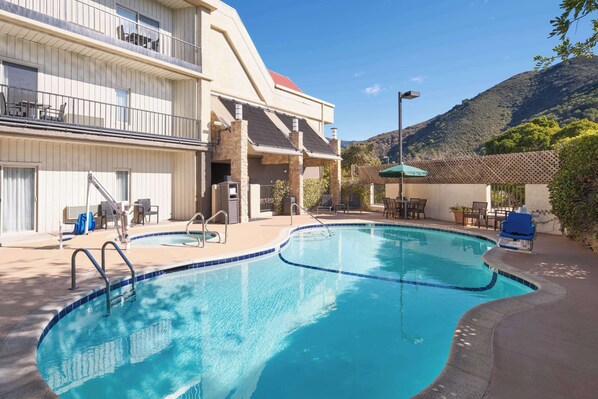 Outdoor pool, open 6:00 AM to 10:00 PM, sun loungers