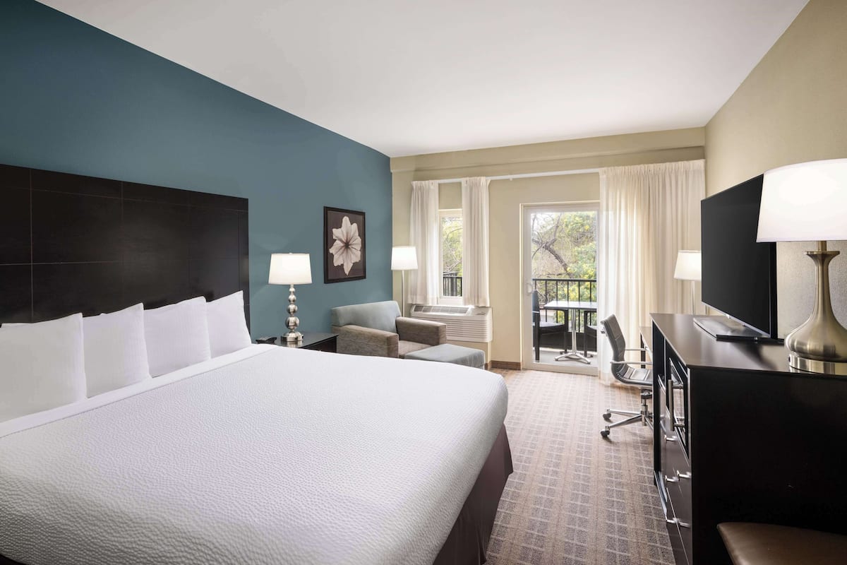 Premium bedding, pillow-top beds, desk, laptop workspace