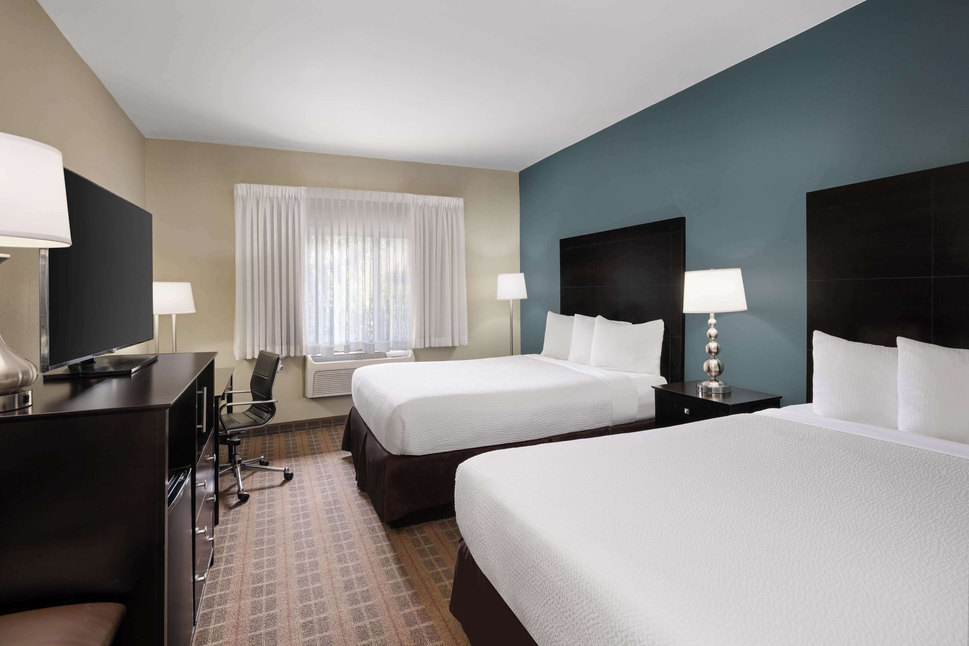 standard room, 2 queen beds, non smoking (walk-in shower) | 1 bedroom, premium bedding, pillow-top beds, desk