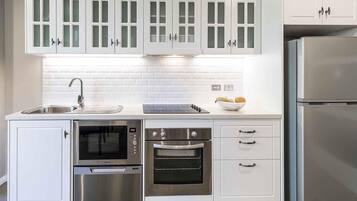 Apartment, 1 Bedroom | Premium bedding, in-room safe, laptop workspace, iron/ironing board