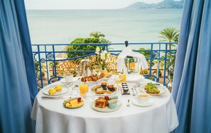 A table set for breakfast with a view of the sea. - Hôtel Martinez, in The Unbound Collection by Hyatt (Cannes)