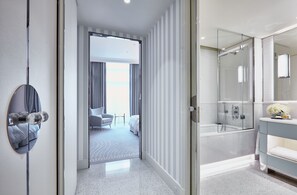 Designer toiletries, hair dryer, bathrobes, slippers