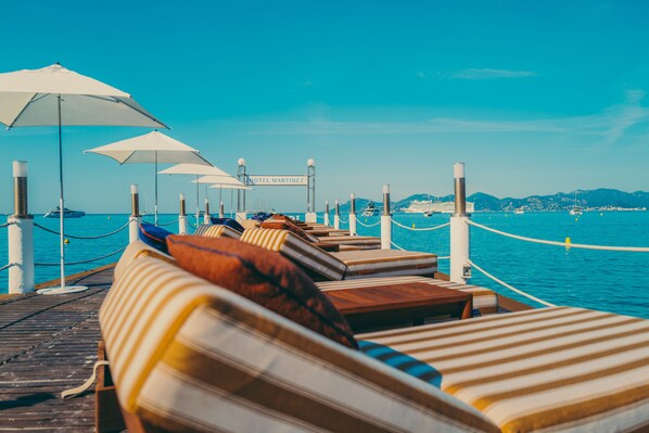 Private beach, sun loungers, beach umbrellas, beach towels