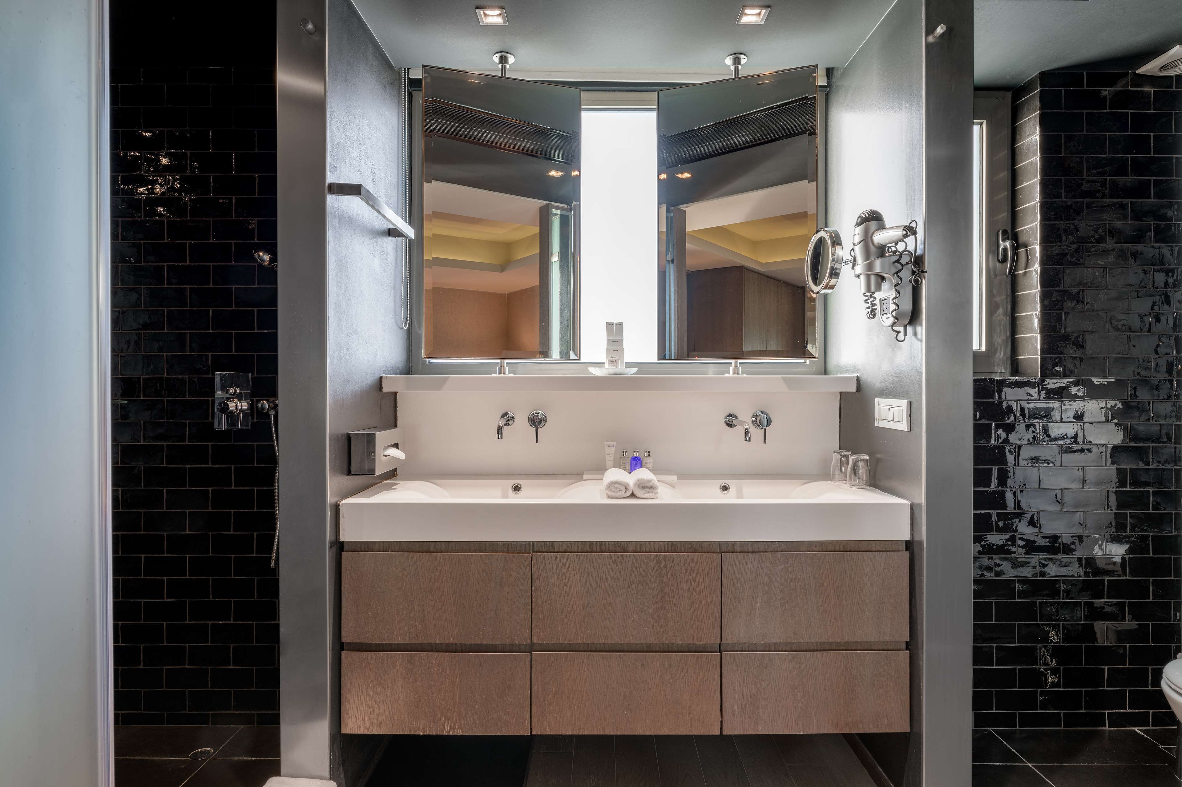 suite (acropolis view) | bathroom | rainfall showerhead, designer toiletries, hair dryer, slippers