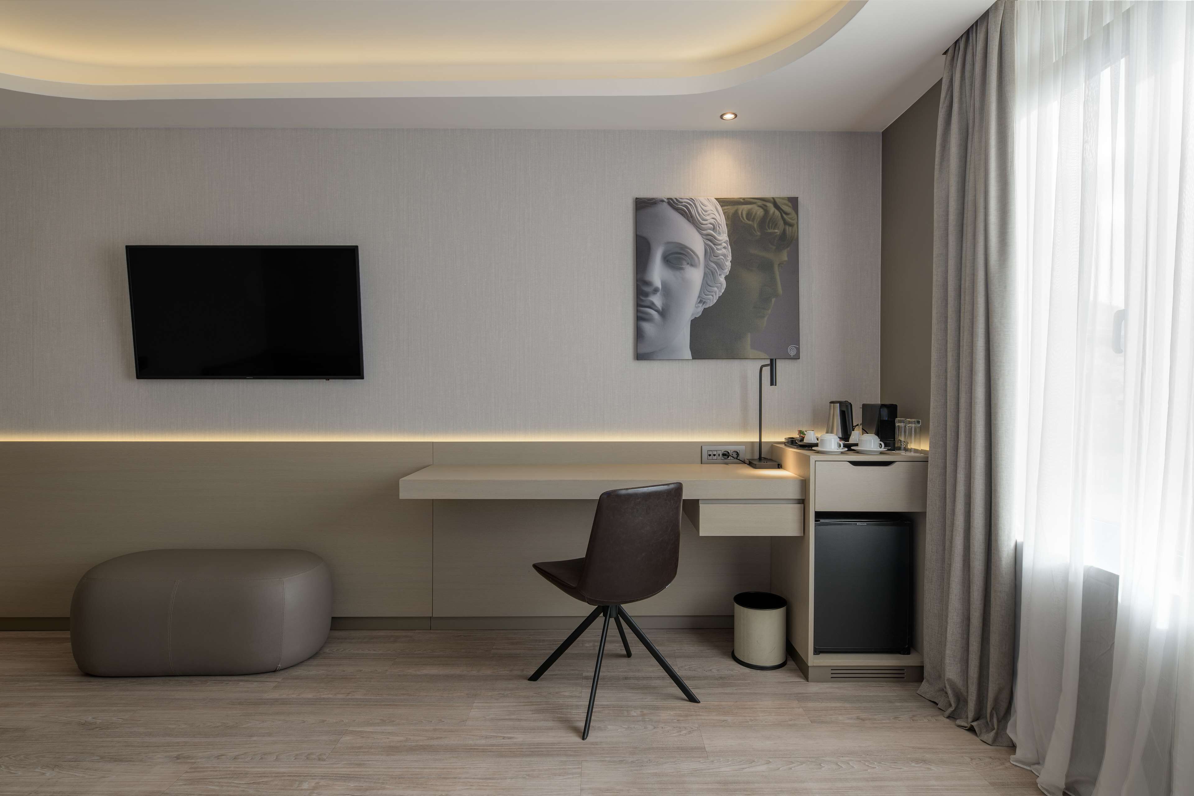 family room | premium bedding, minibar, in-room safe, individually furnished