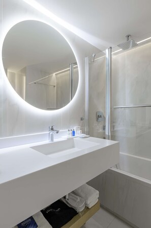 Superior Room | Bathroom | Rainfall showerhead, designer toiletries, hair dryer, slippers