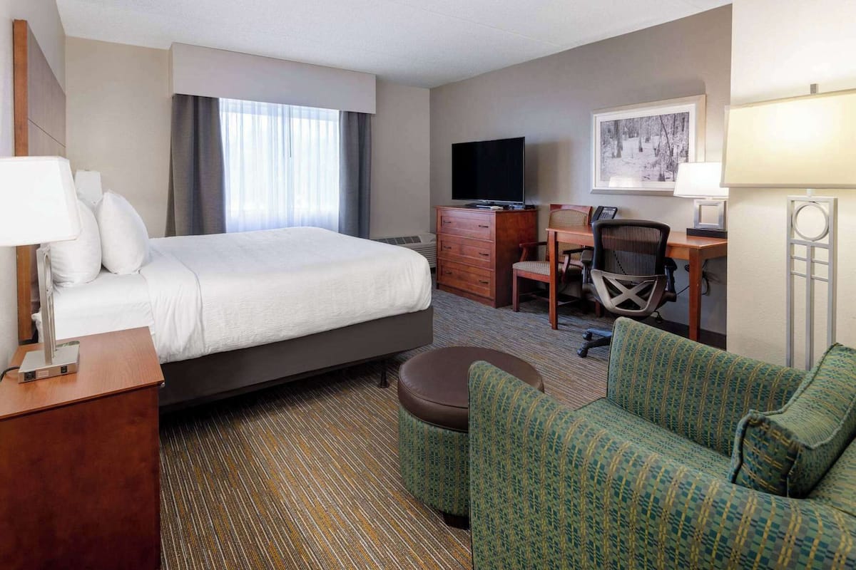 Premium bedding, pillow-top beds, desk, blackout curtains