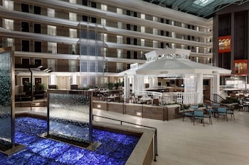 Hotel entrance and lobby at Embassy Suites by Hilton Orlando Lake Buena Vista Resort