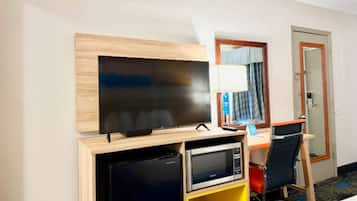 Een strijkplank/strijkijzer, gratis babybedden, extra bedden
