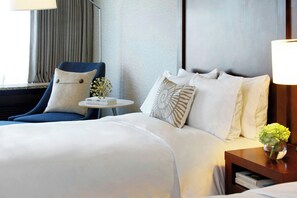 Premium bedding, down comforters, in-room safe, desk