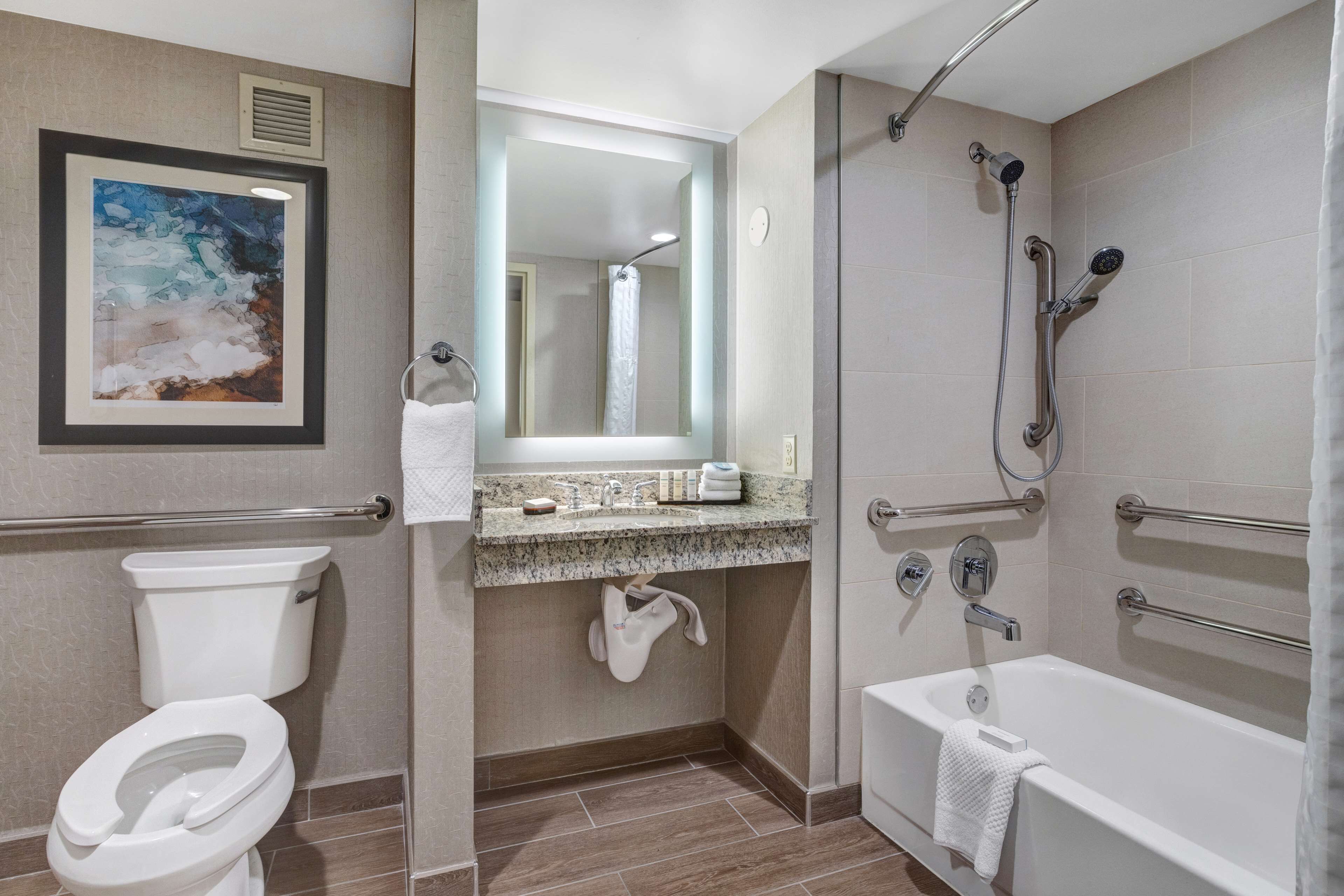 one king bed, non-smoking, accessible | bathroom | free toiletries, hair dryer, bathrobes, towels