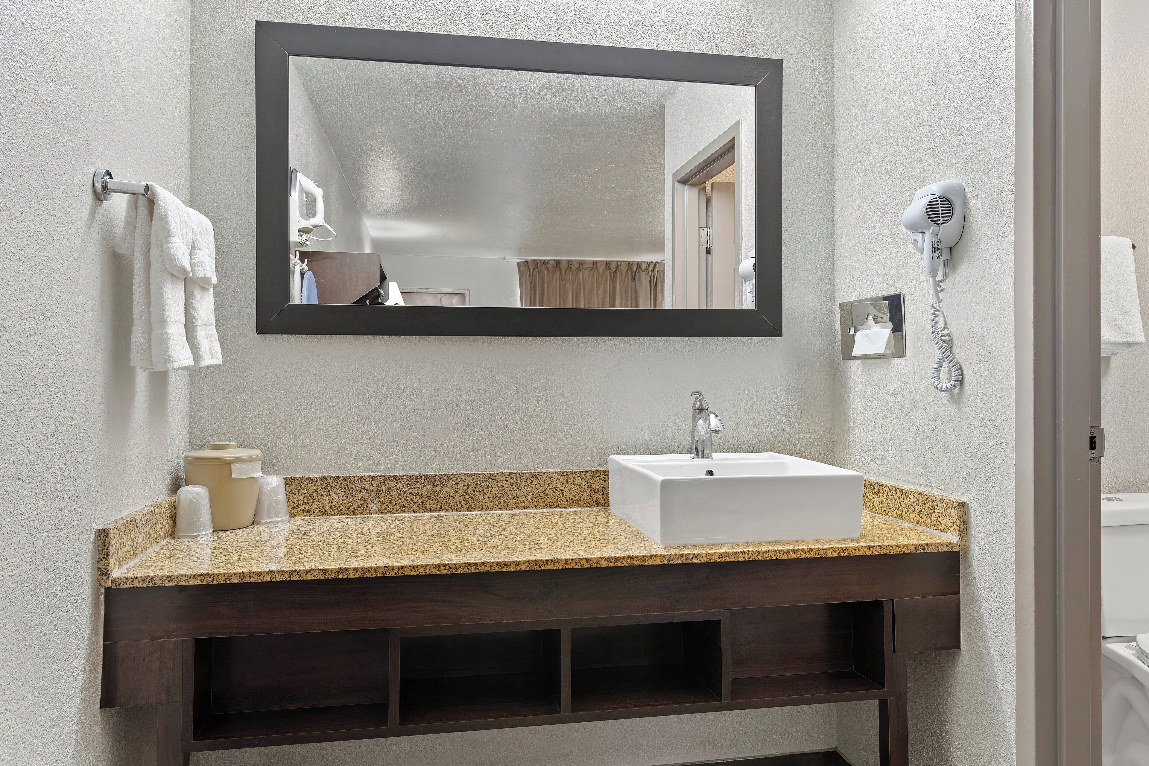 superior room, 1 king bed, non smoking | bathroom | hair dryer, towels, soap, shampoo