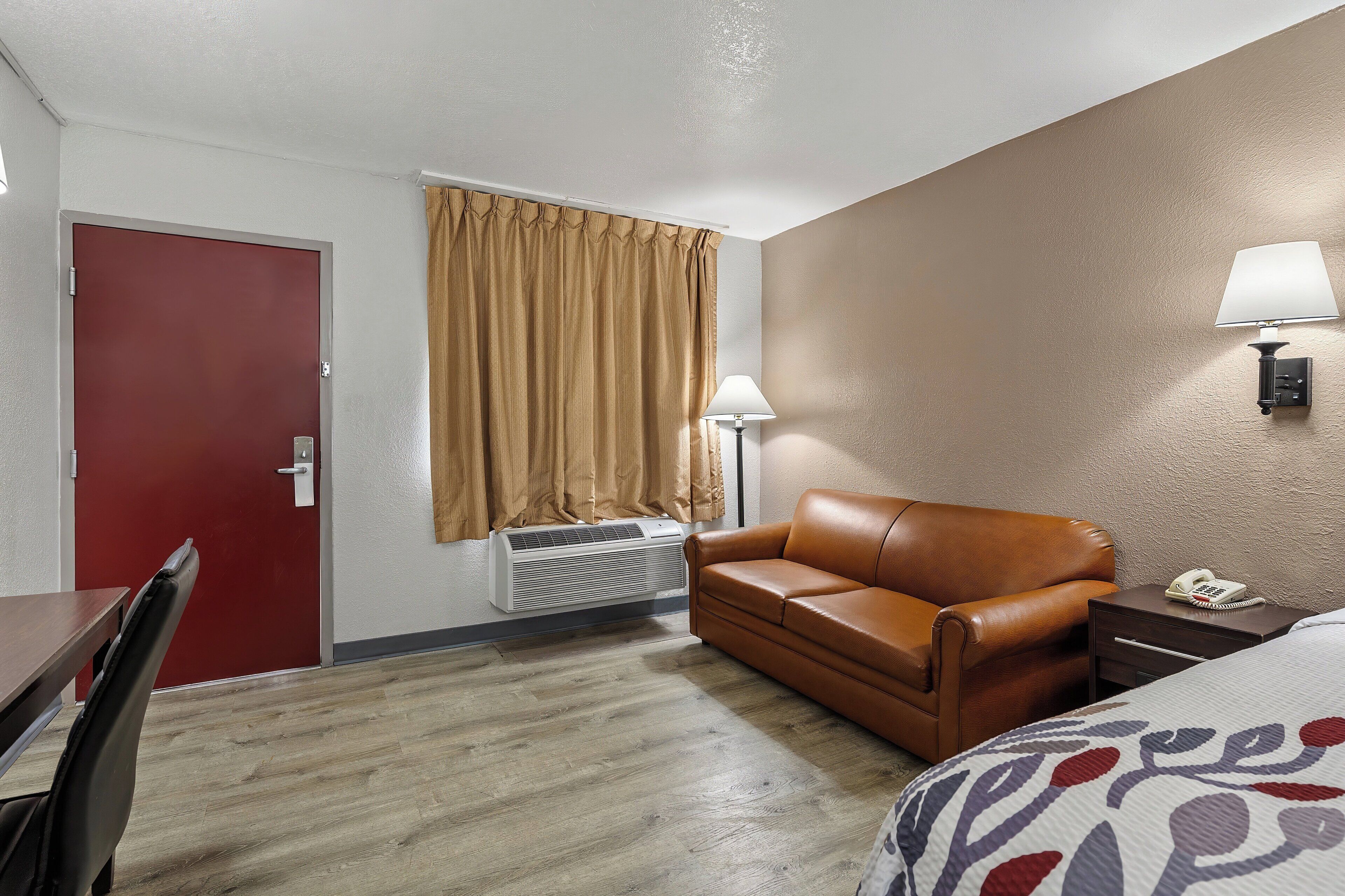 deluxe room, 1 king bed, non smoking | desk, laptop workspace, blackout curtains, iron/ironing board