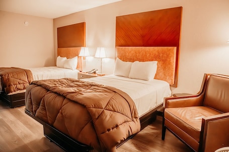 Premium bedding, iron/ironing board, bed sheets, alarm clocks