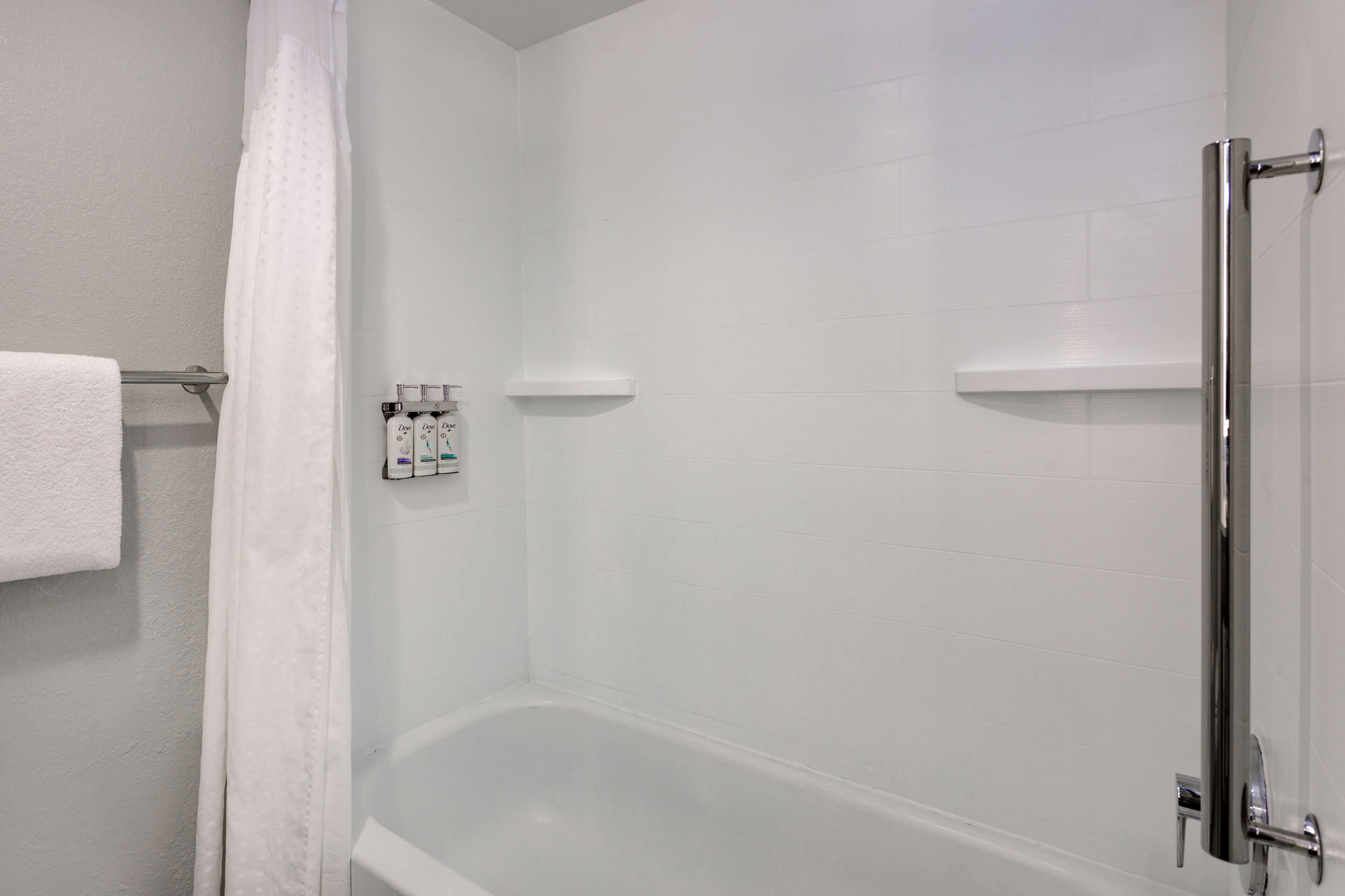 combined shower/bathtub, free toiletries, hair dryer, towels