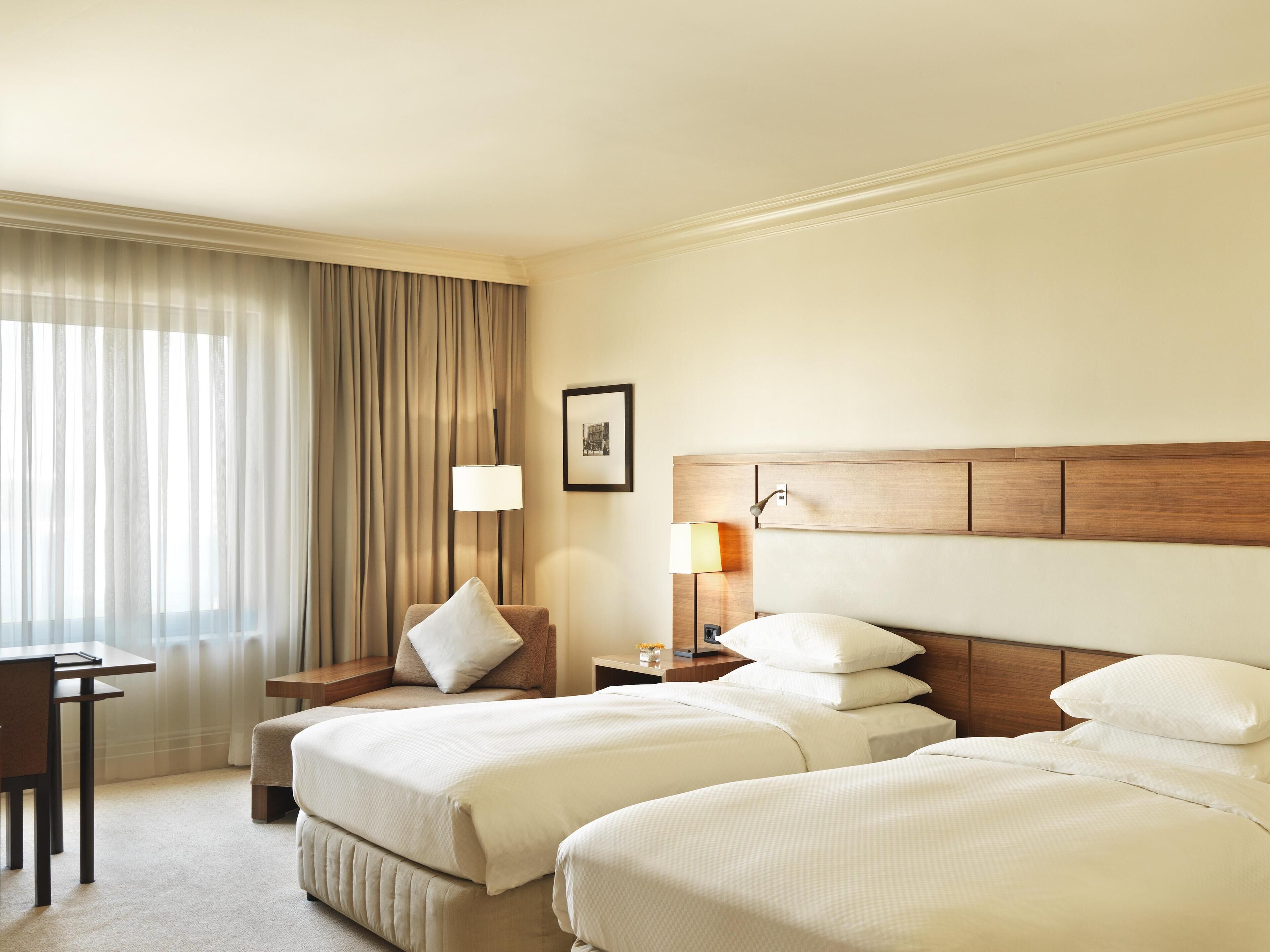 Hypo-allergenic bedding, minibar, in-room safe, desk