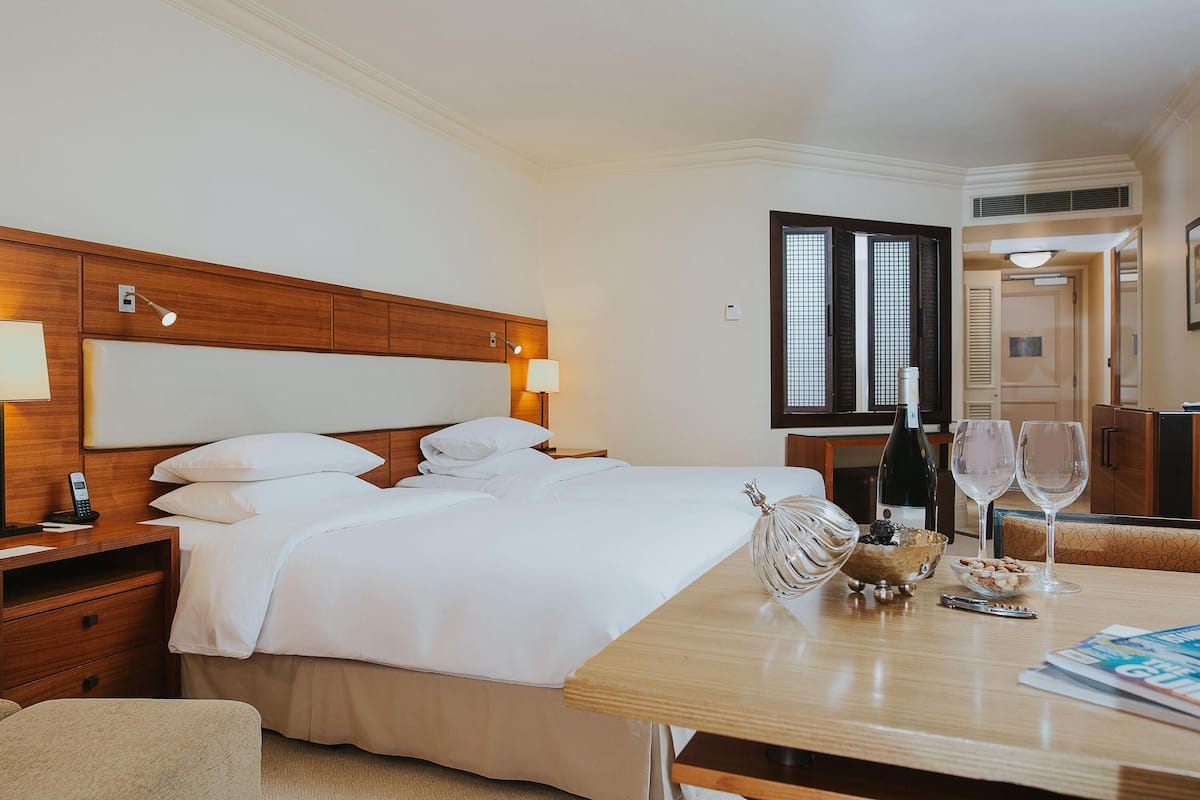 Hypo-allergenic bedding, minibar, in-room safe, desk