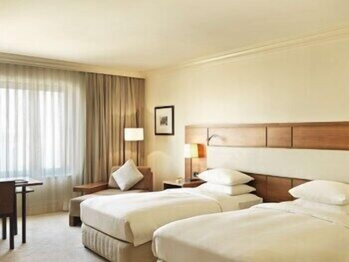 Hypo-allergenic bedding, minibar, in-room safe, desk