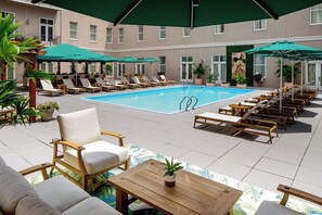 Outdoor pool, open 7:00 AM to 10:00 PM, pool umbrellas, sun loungers