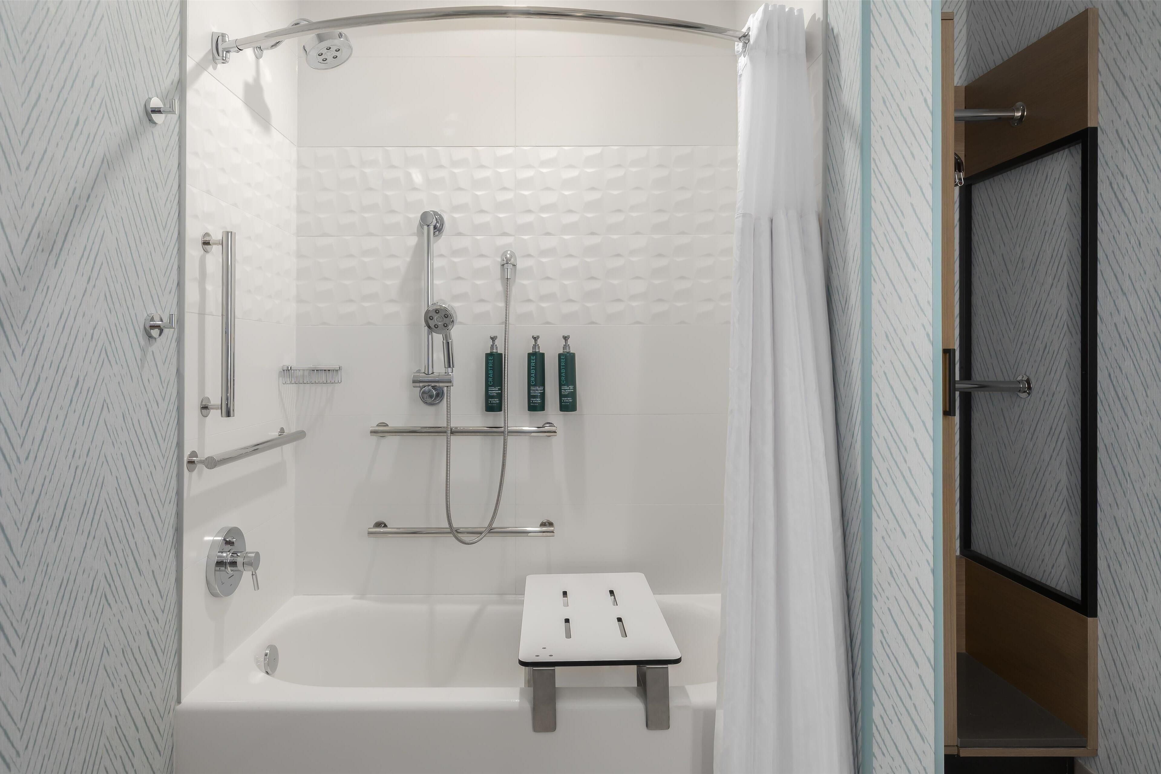 combined shower/bathtub, free toiletries, hair dryer, towels