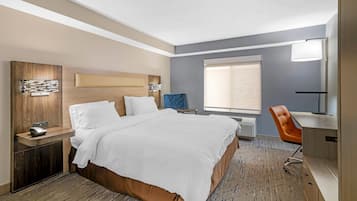 Habitación, 1 cama de matrimonio grande, ducha con asiento, no fumadores | Caja fuerte, escritorio, tabla de planchar con plancha y cunas gratuitas