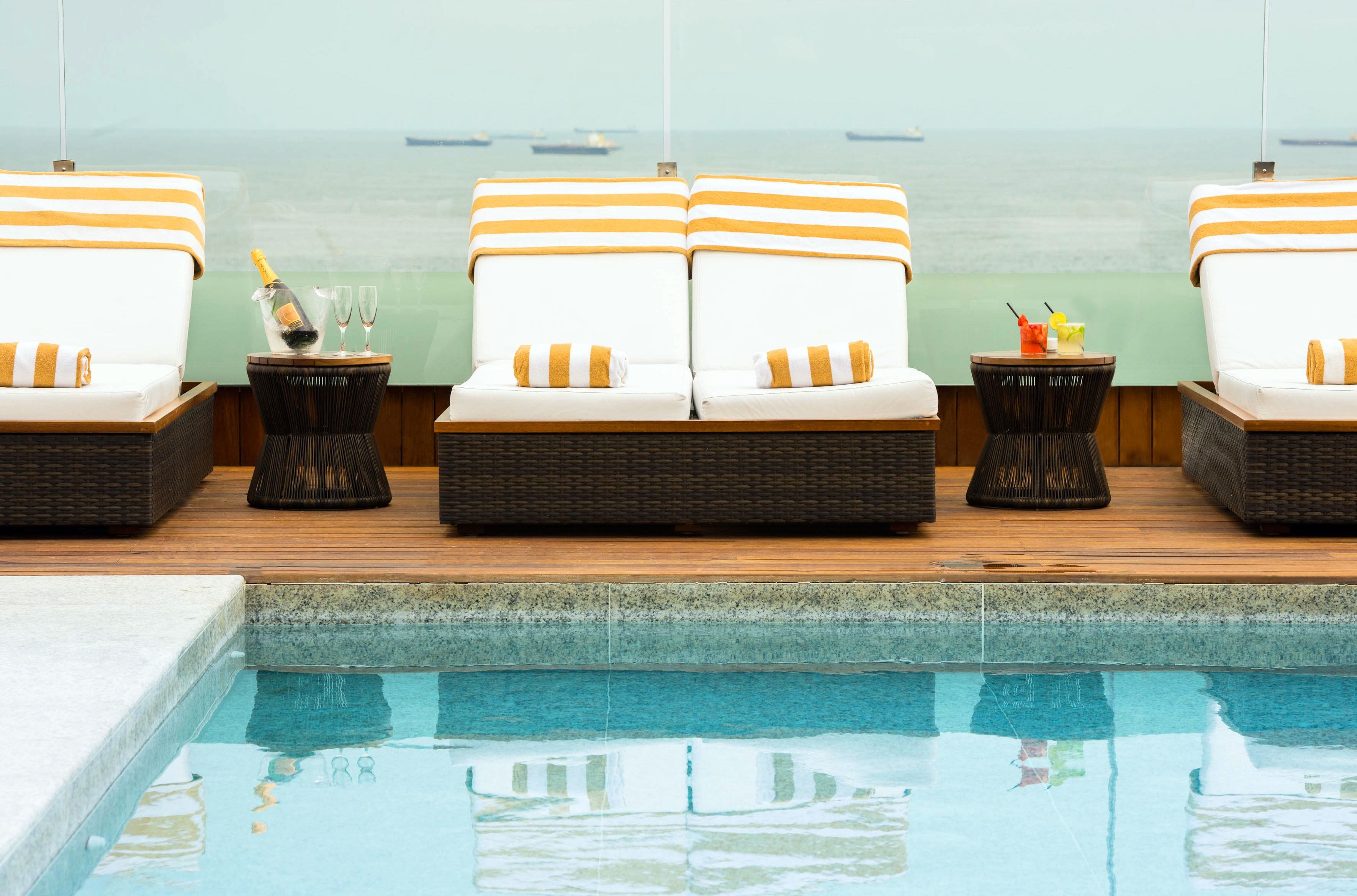 outdoor pool, pool umbrellas, pool loungers