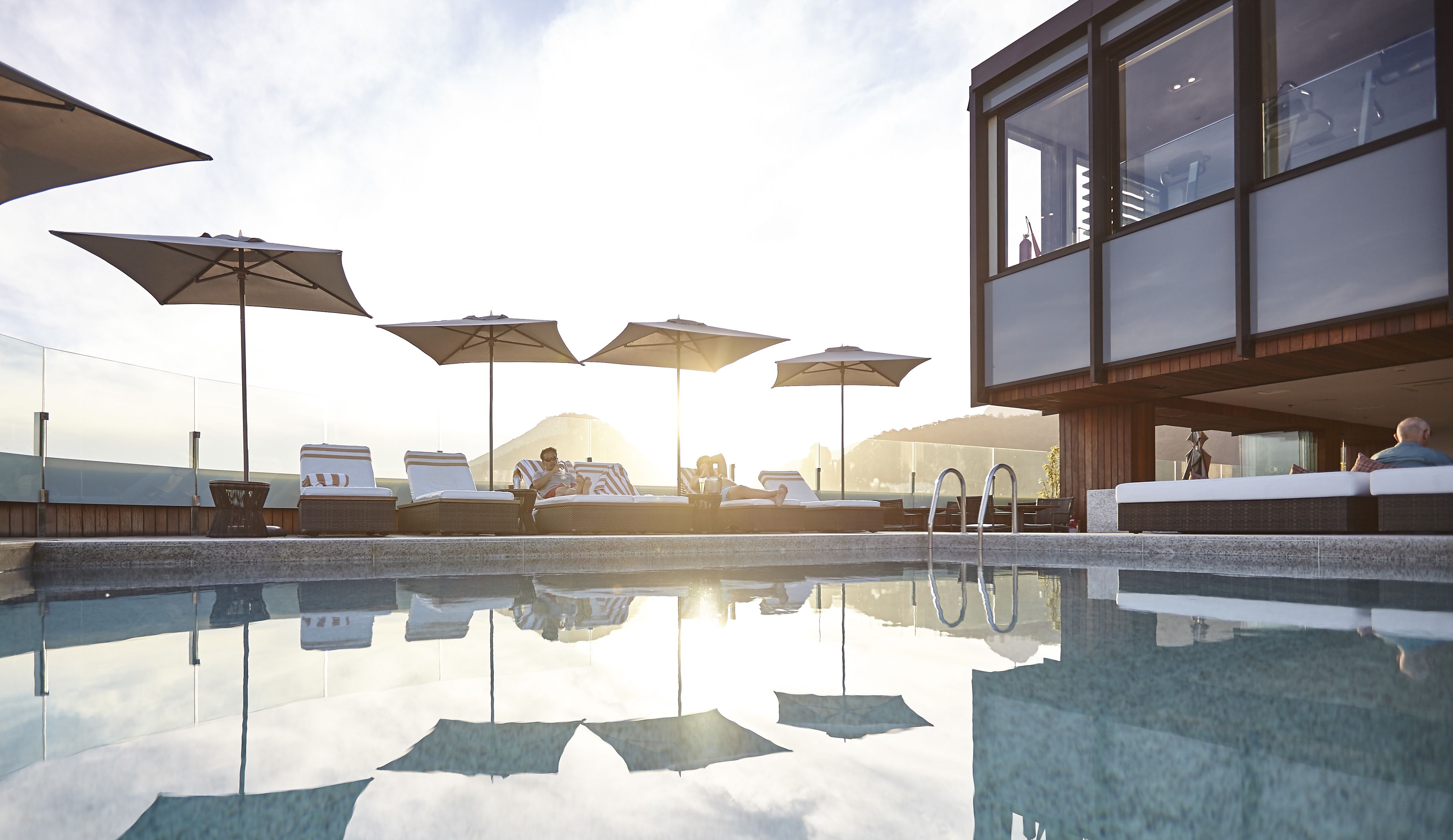 Outdoor pool, pool umbrellas, sun loungers