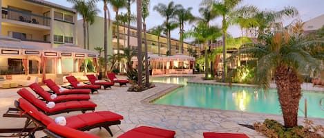 Outdoor pool, open 7:00 AM to 10:00 PM, pool cabanas (surcharge)