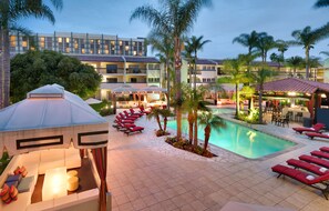 Outdoor pool, open 7:00 AM to 10:00 PM, cabanas (surcharge)