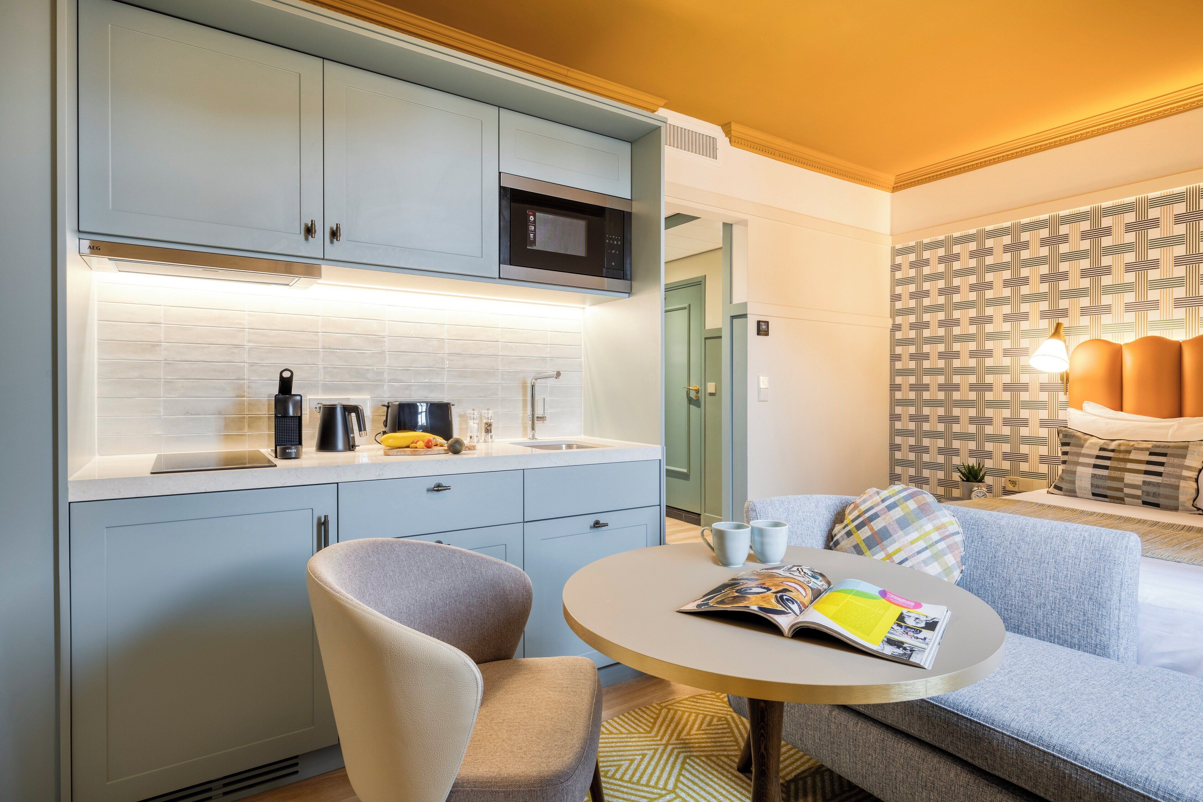 One-Bedroom Executive Apartment | Private kitchen | Mini-fridge, espresso maker, electric kettle