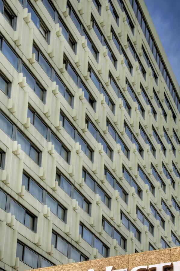 A modern building with a repeating geometric facade and large windows. - The Westin Zagreb (Zagreb)