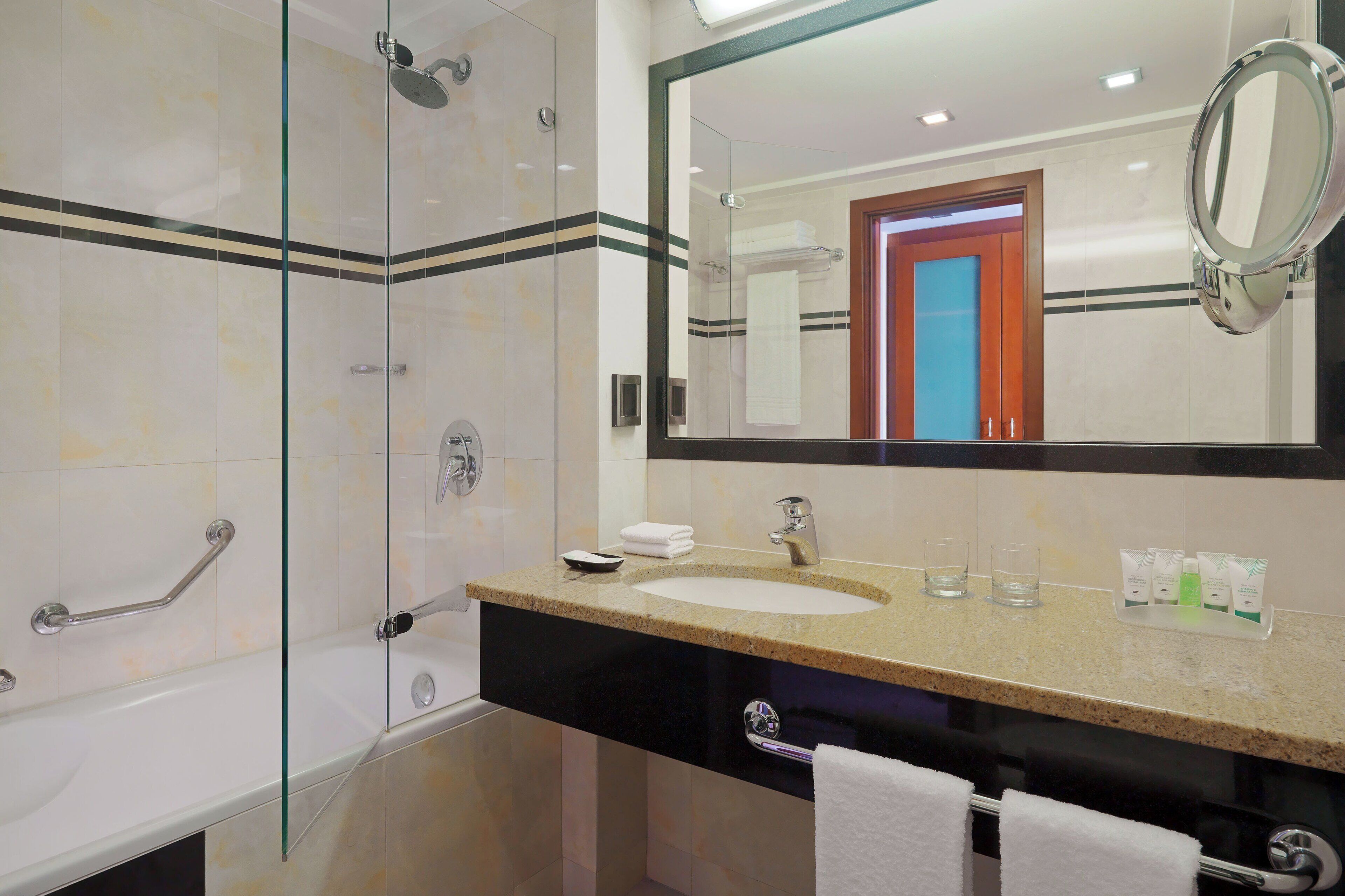 combined shower/bathtub, free toiletries, hair dryer, bathrobes