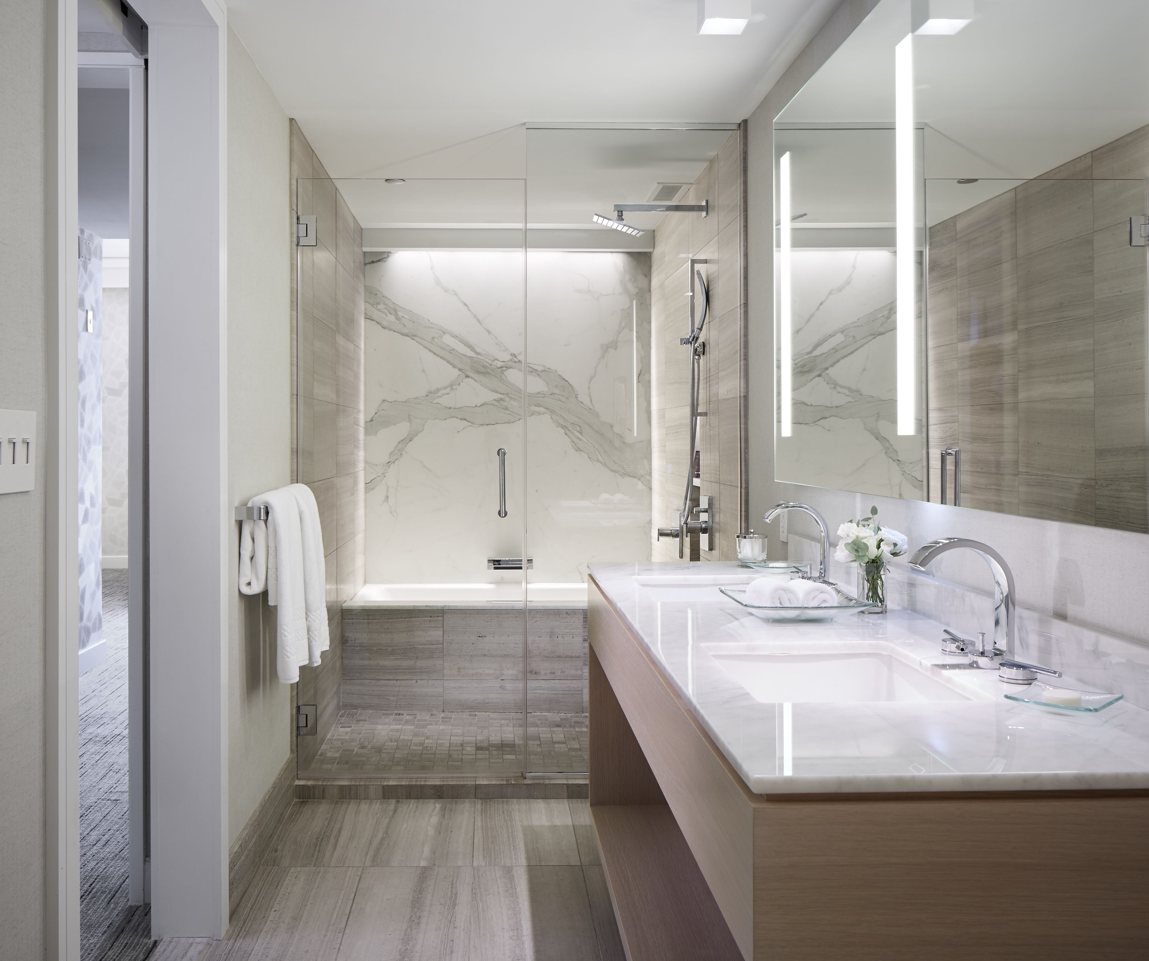 designer toiletries, hair dryer, bathrobes, slippers