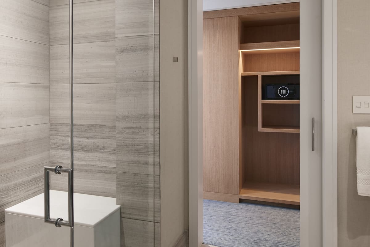 Designer toiletries, hair dryer, bathrobes, slippers