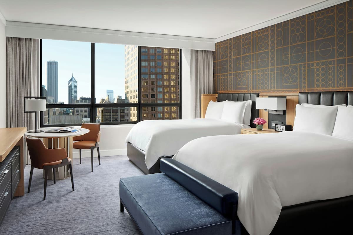 Premium bedding, down comforters, pillowtop beds, minibar