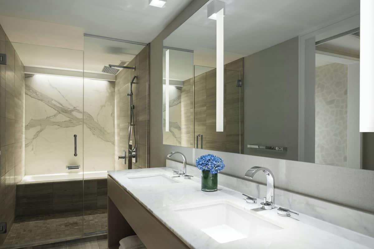 Designer toiletries, hair dryer, bathrobes, slippers