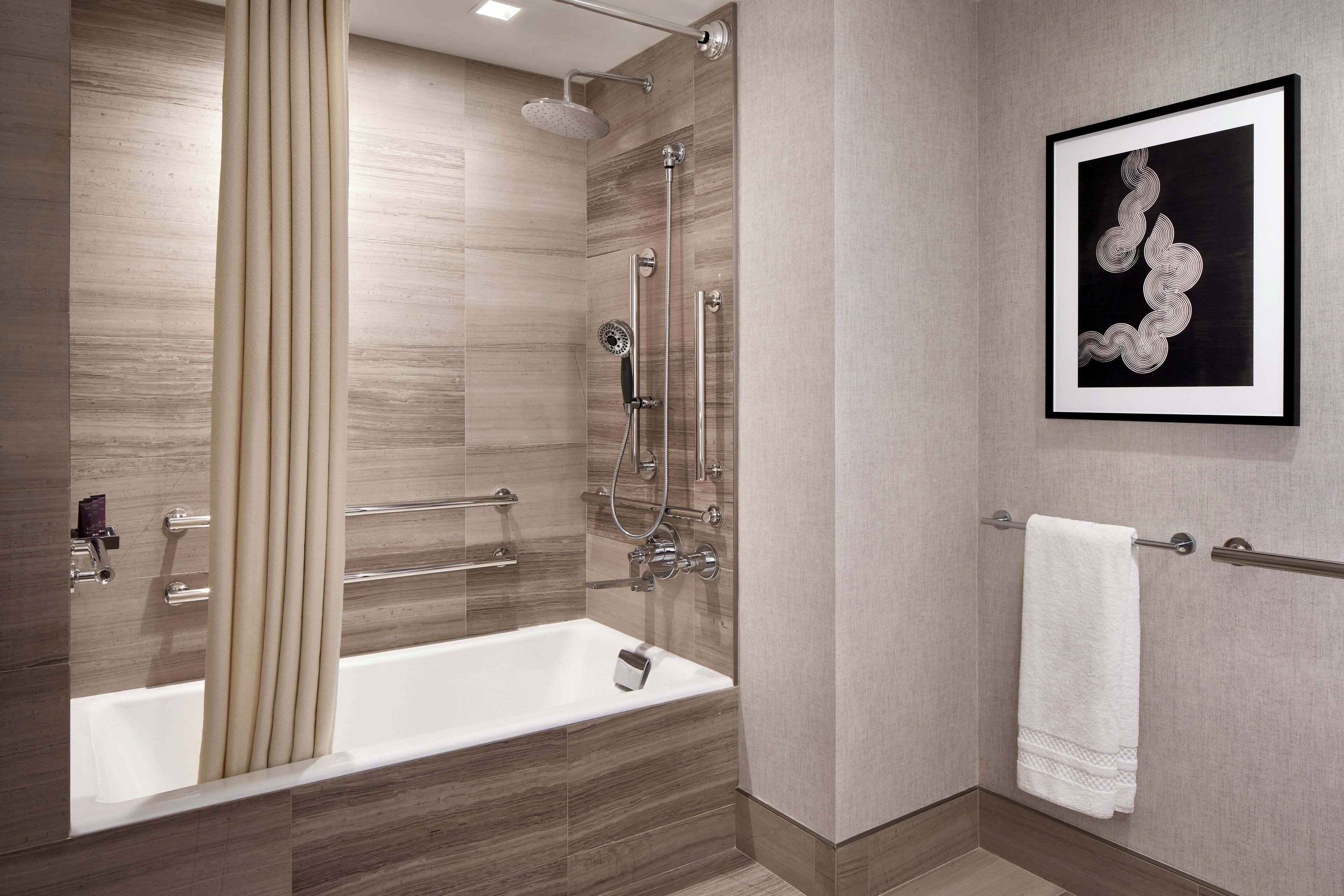 Designer toiletries, hair dryer, bathrobes, slippers